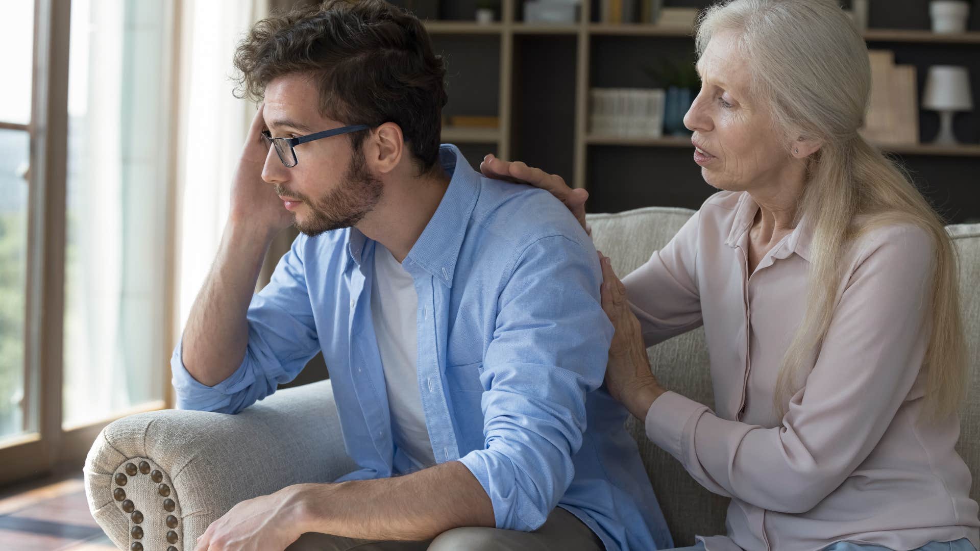Man saying "Can't you just figure it out?" to his upset mother.