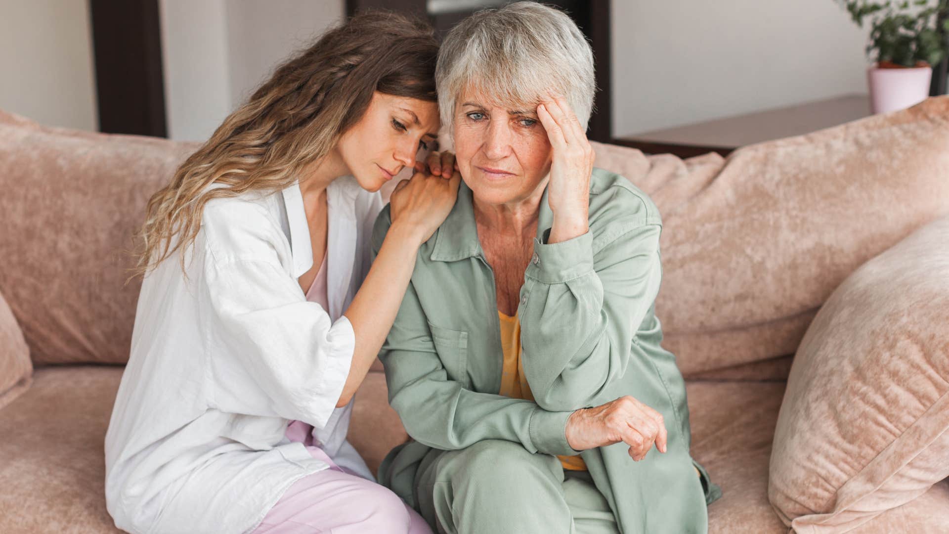 Woman saying "I'm really struggling" to her concerned mother.