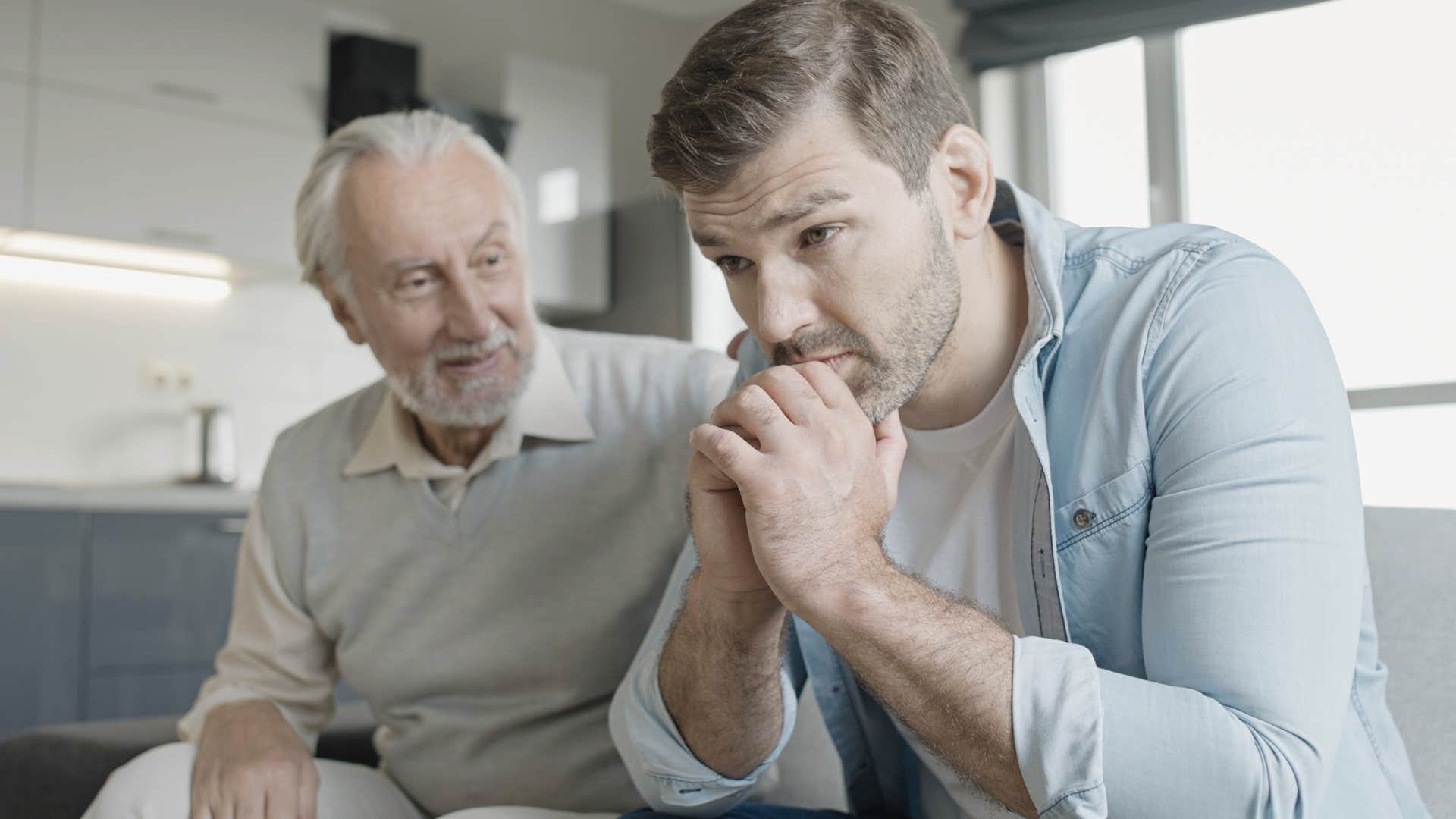 Man saying "that's not my job" to his father at home.