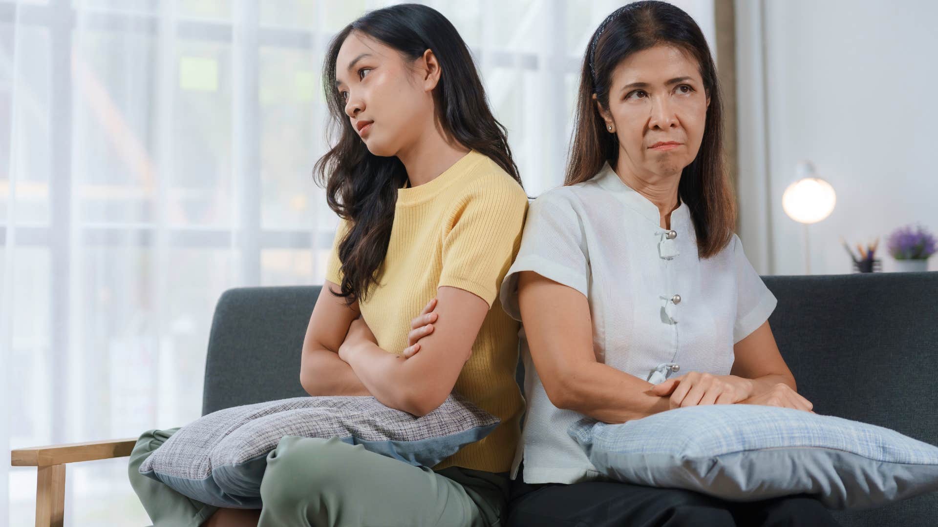 Woman saying "their parents pay their bills" to her mom at home.