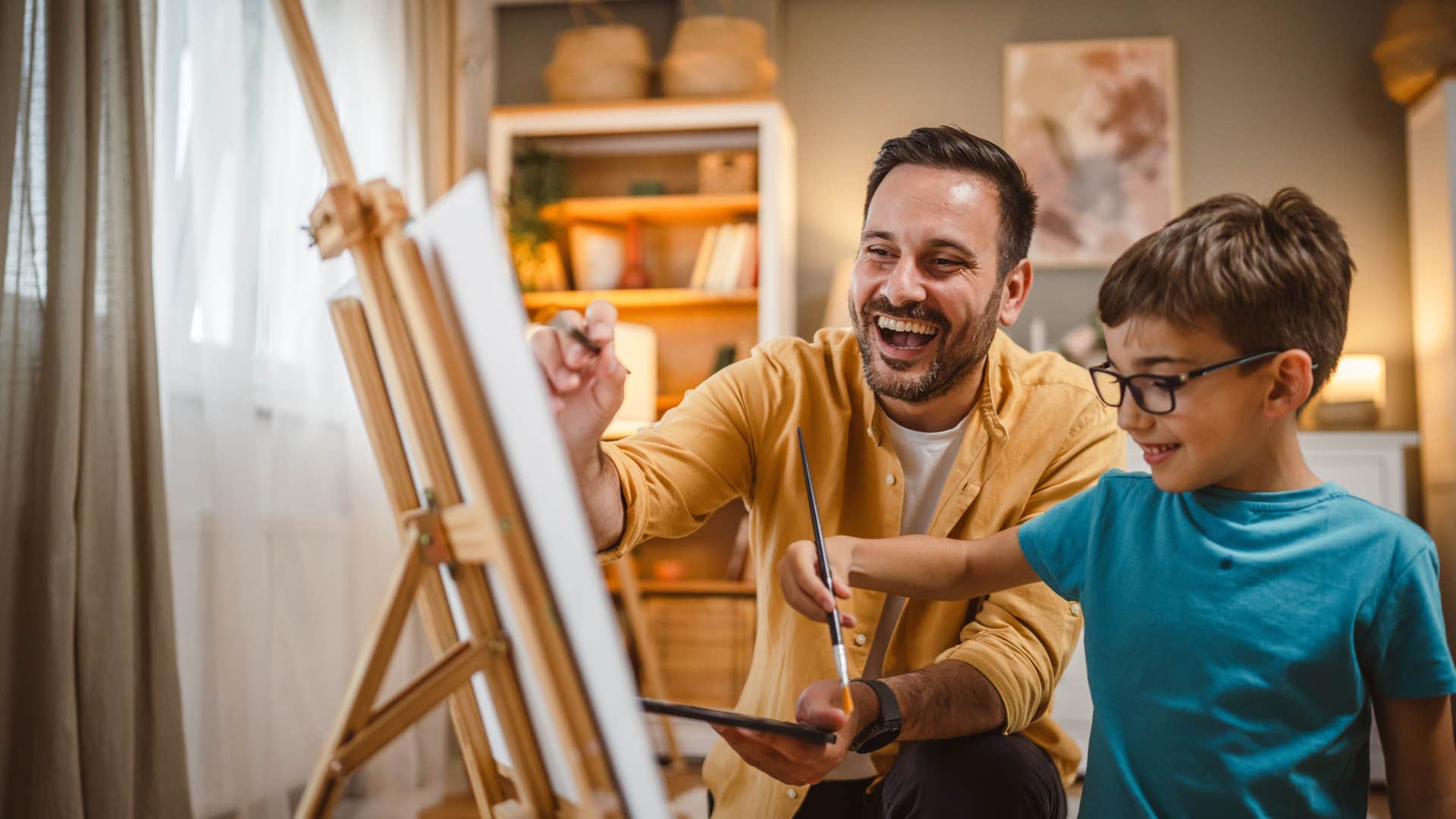dad painting with his son