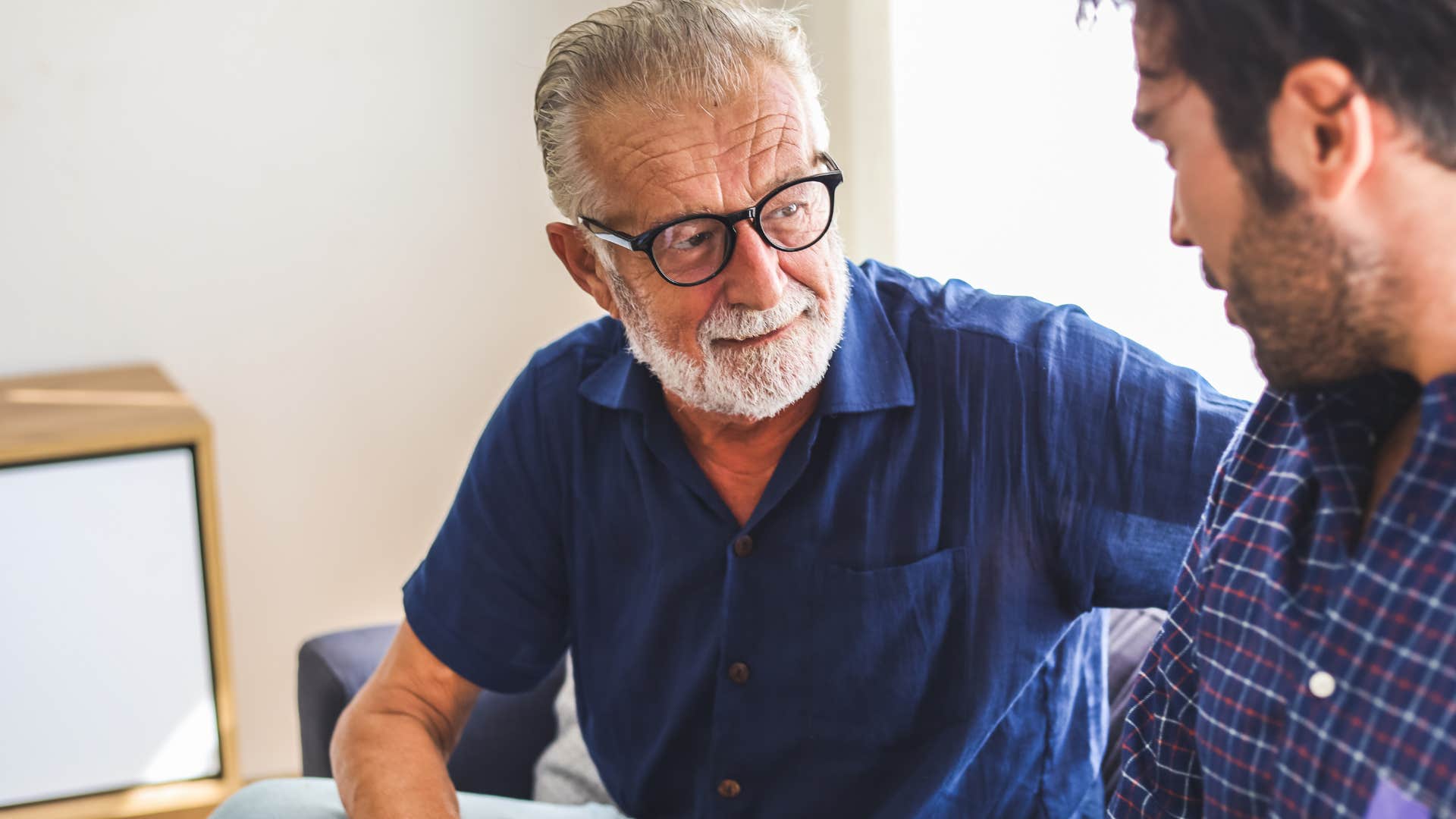 older father overly interested in his adult son's life