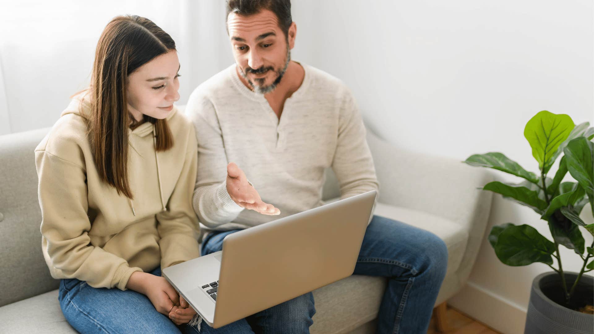 father warning teen daughter of internet safety