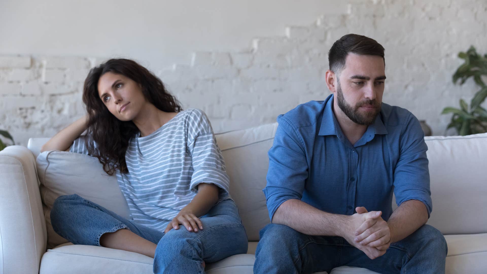 man refusing to apologize to his upset wife