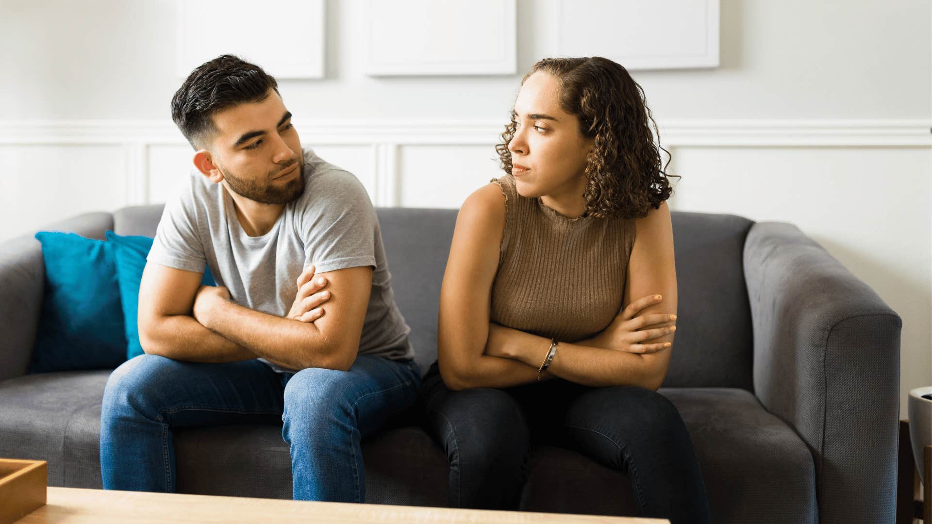man avoiding affection with wife
