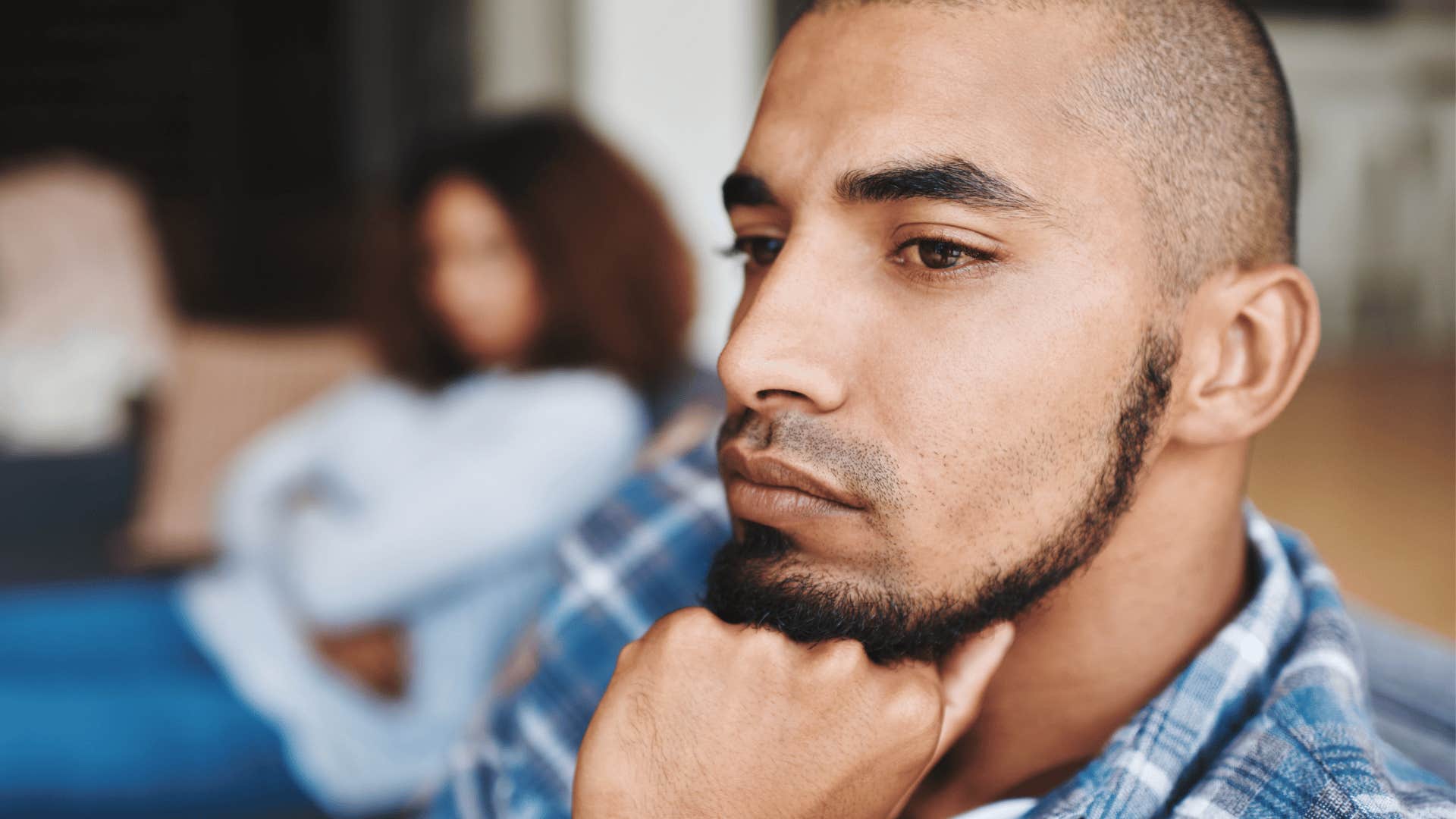man feeling detached from wife
