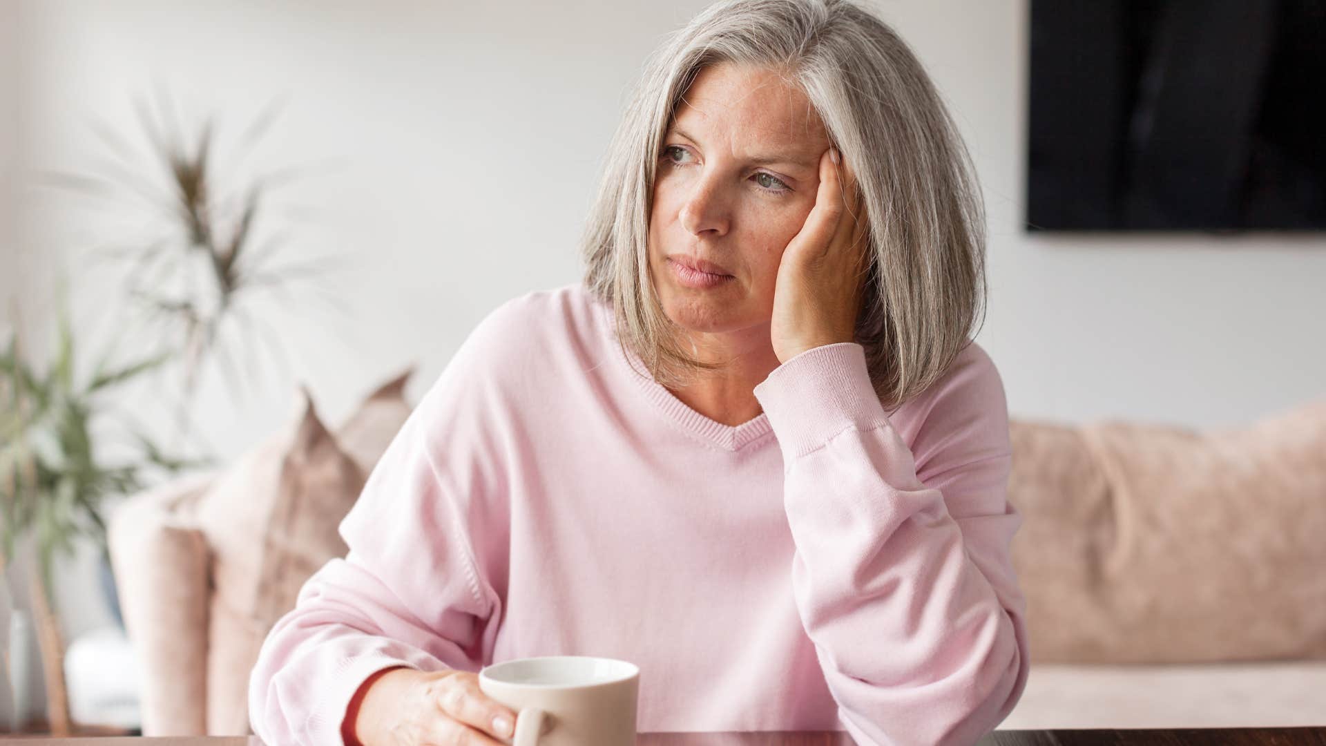 older woman dismissing her own feelings