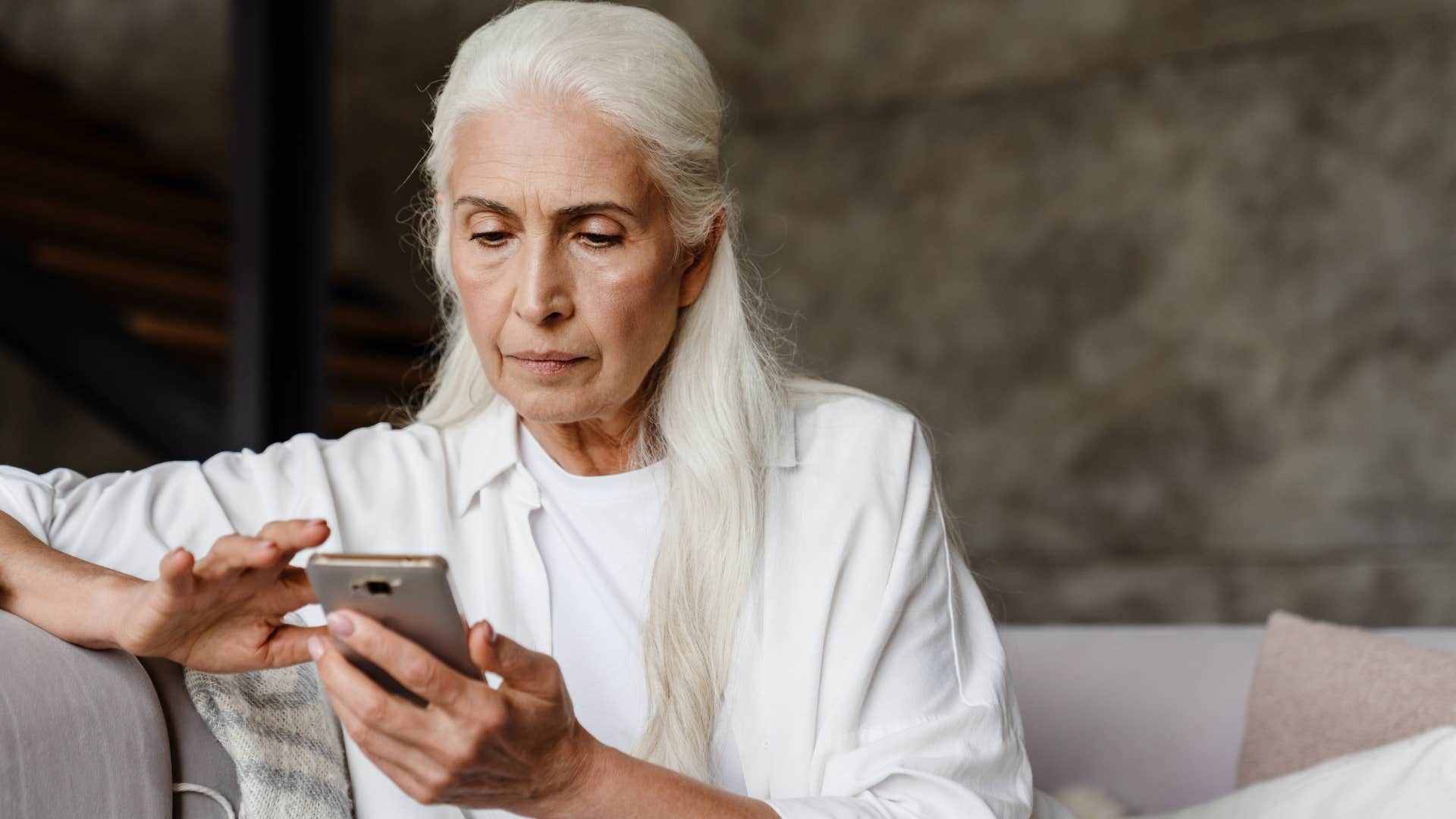 Woman texting "I don't want to bother you" on her phone.