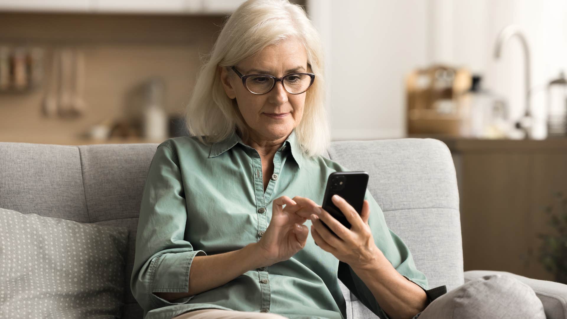 Woman texting "we went to your favorite place today" on her phone.
