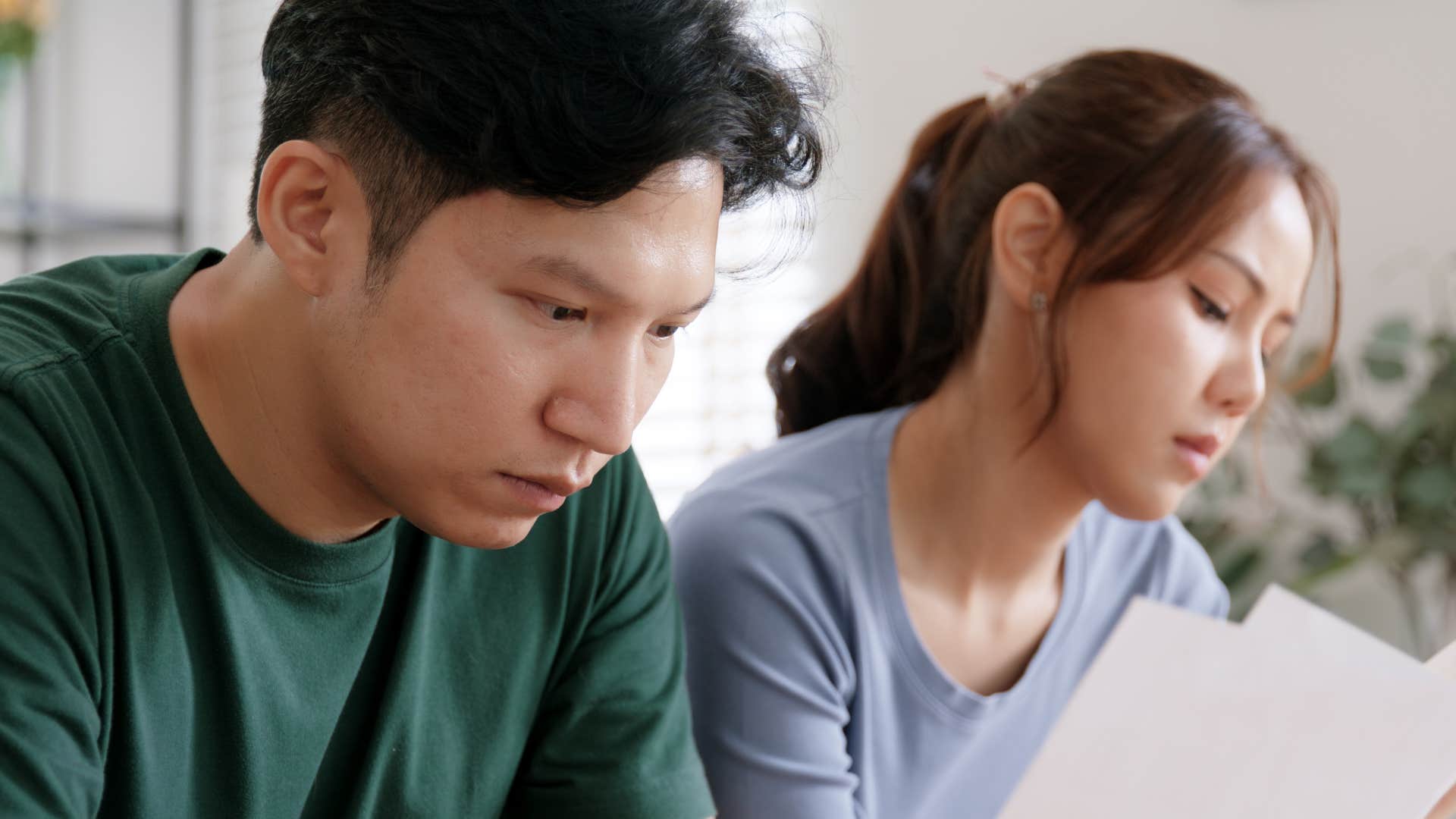 annoyed woman telling upset husband you're great, I know