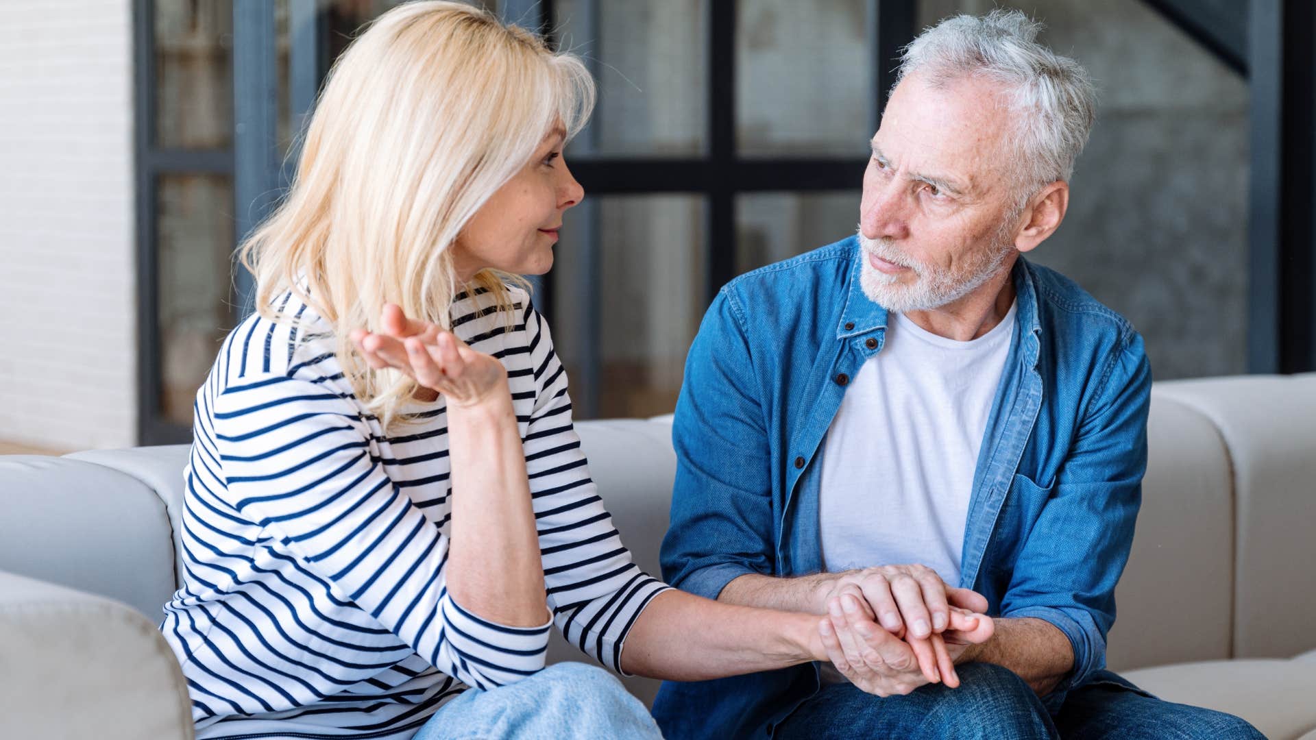 woman saying let's solve this together to her husband at home