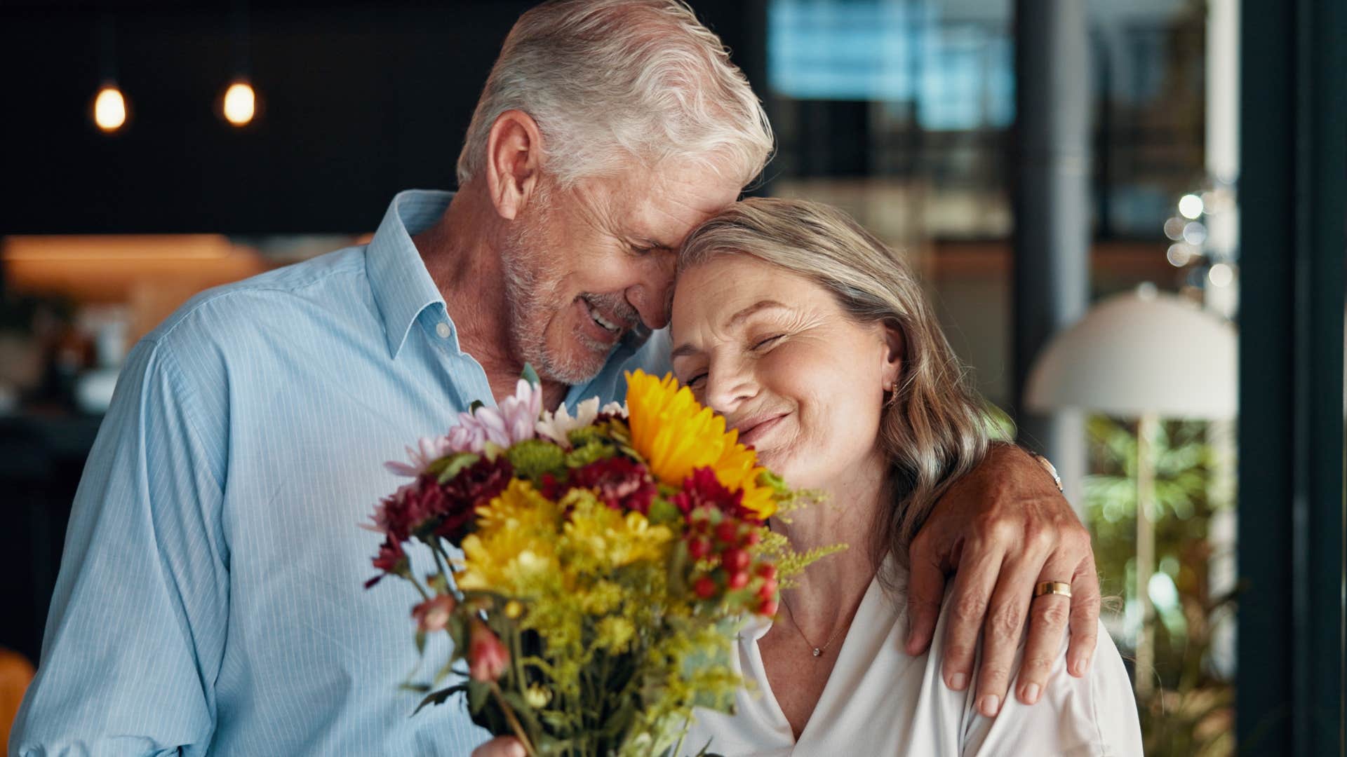 wife saying what would I do without you to husband surprising her with flowers