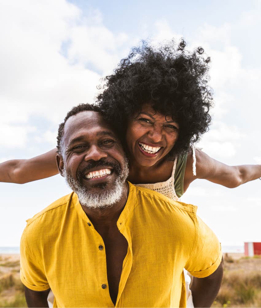 Married couple laugh together