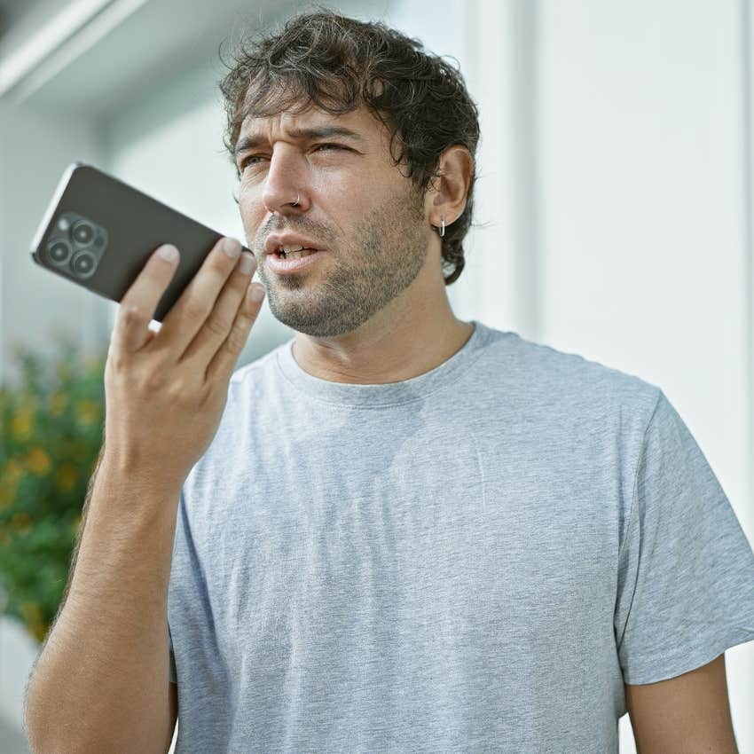Man being vague about their life choices on the phone with a parent