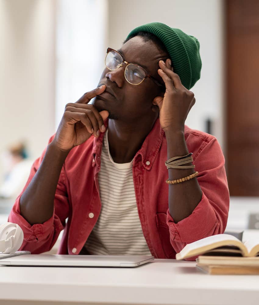 man thinking about the answers for the CRT quick IQ test