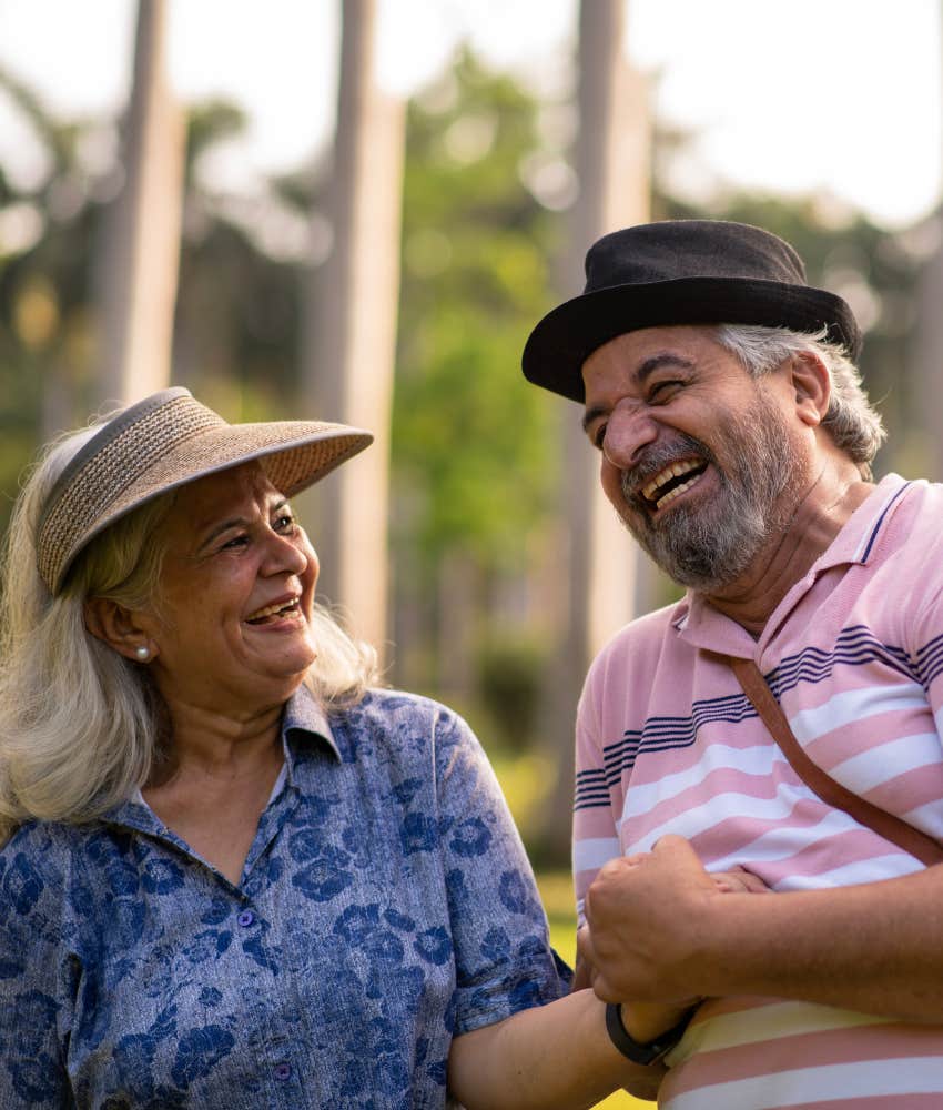 Laughing couple showing way to deal with change