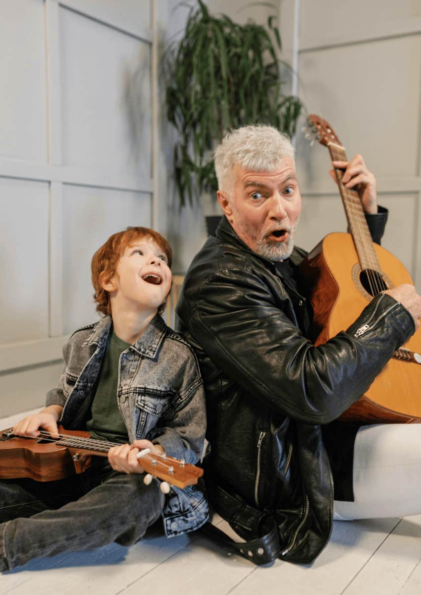 man find happiness in sharing his love for music with a child