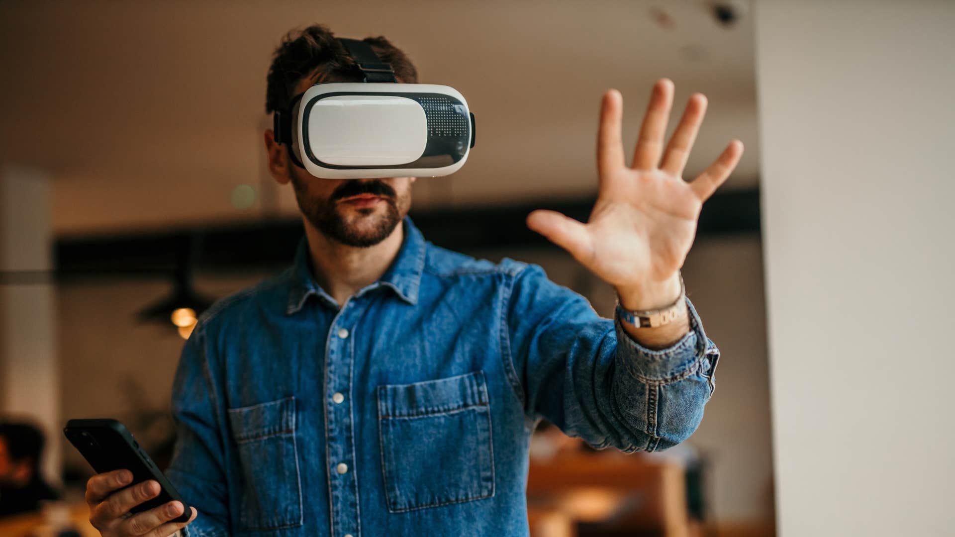 man using expensive gadget vr headset