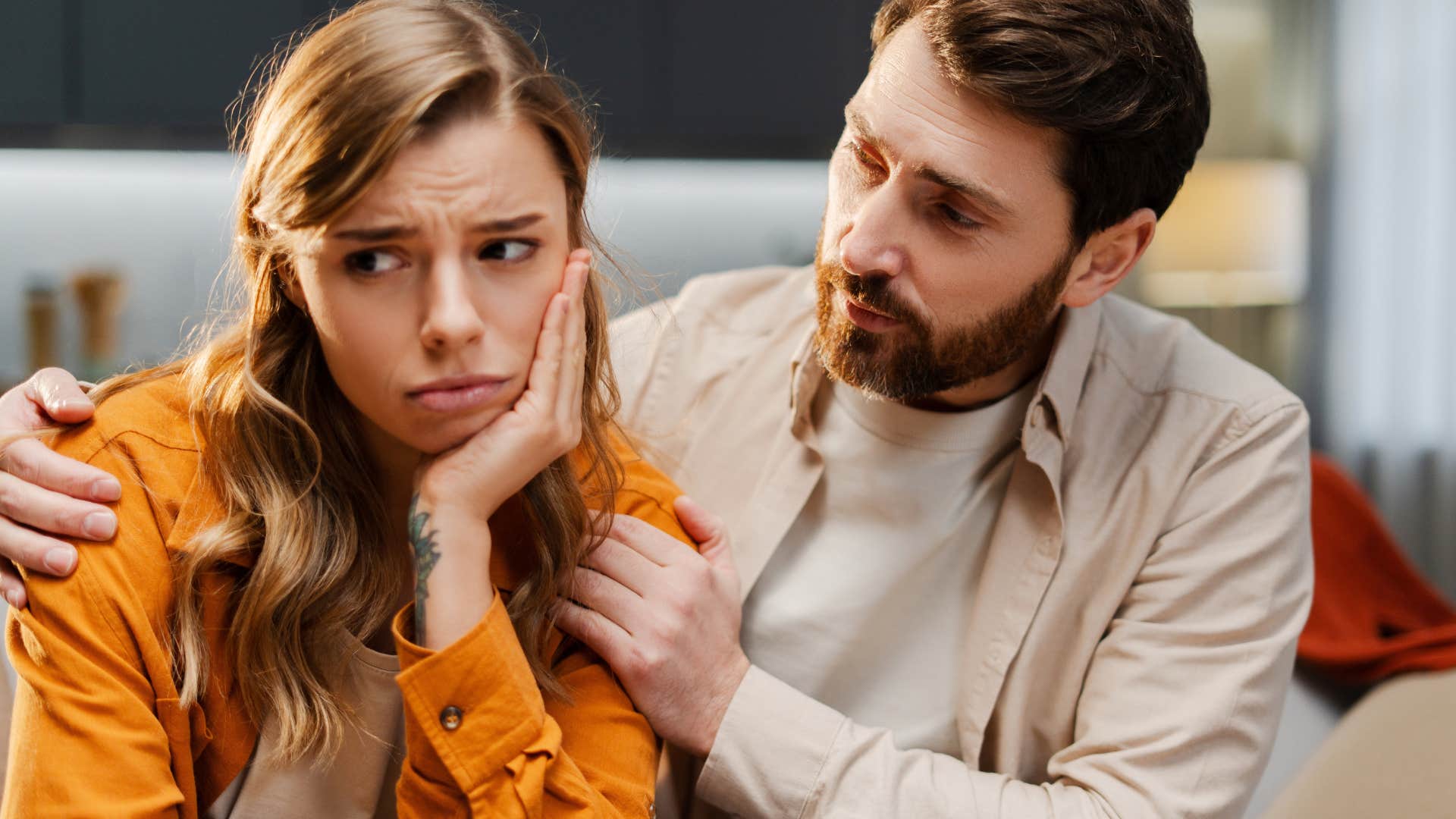 man comforting his friend