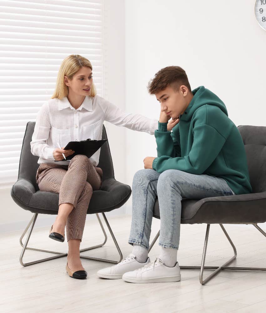 teenage boy talking to therapist