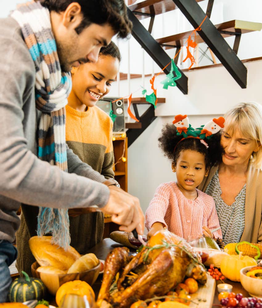 Thoughtful person carves turkey and is careful of actions to survive holiday