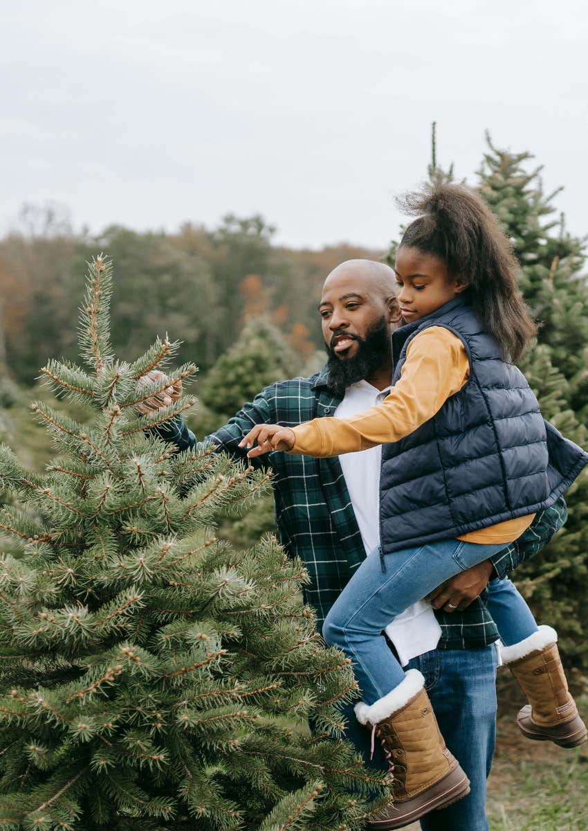 family picking out their Christmas tree