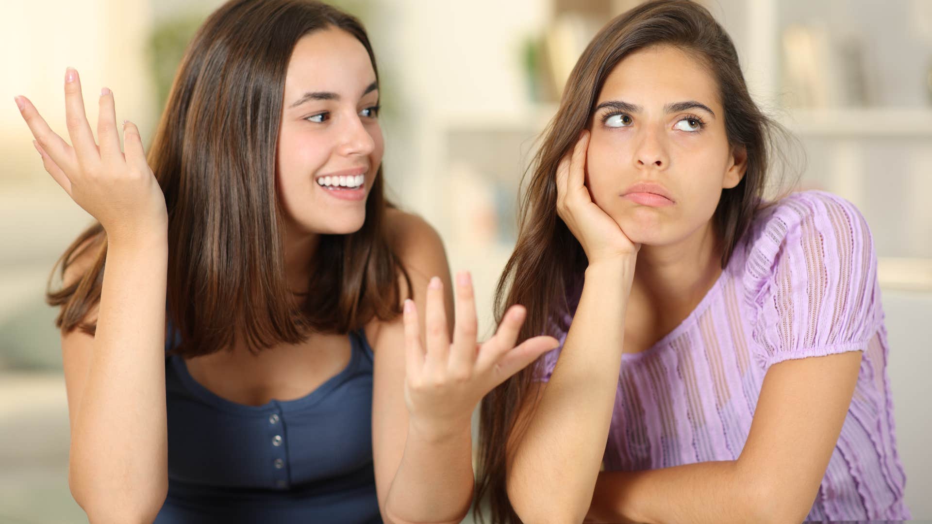 woman rolling her eyes at friend being fake nice