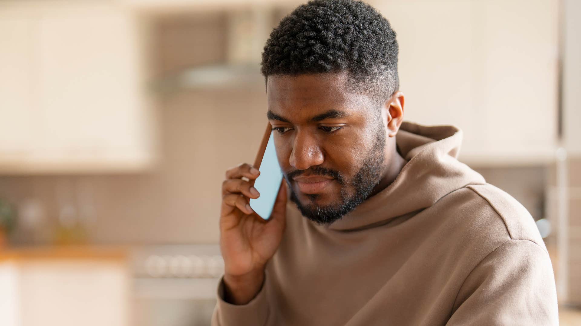 man whose personality always changes talking on the phone