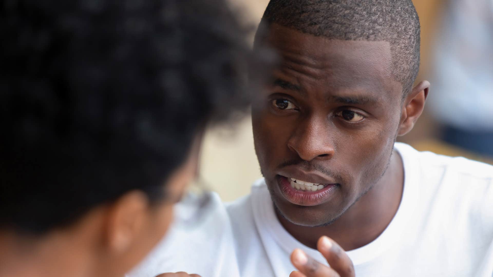 transactional man talking to a friend asking for something