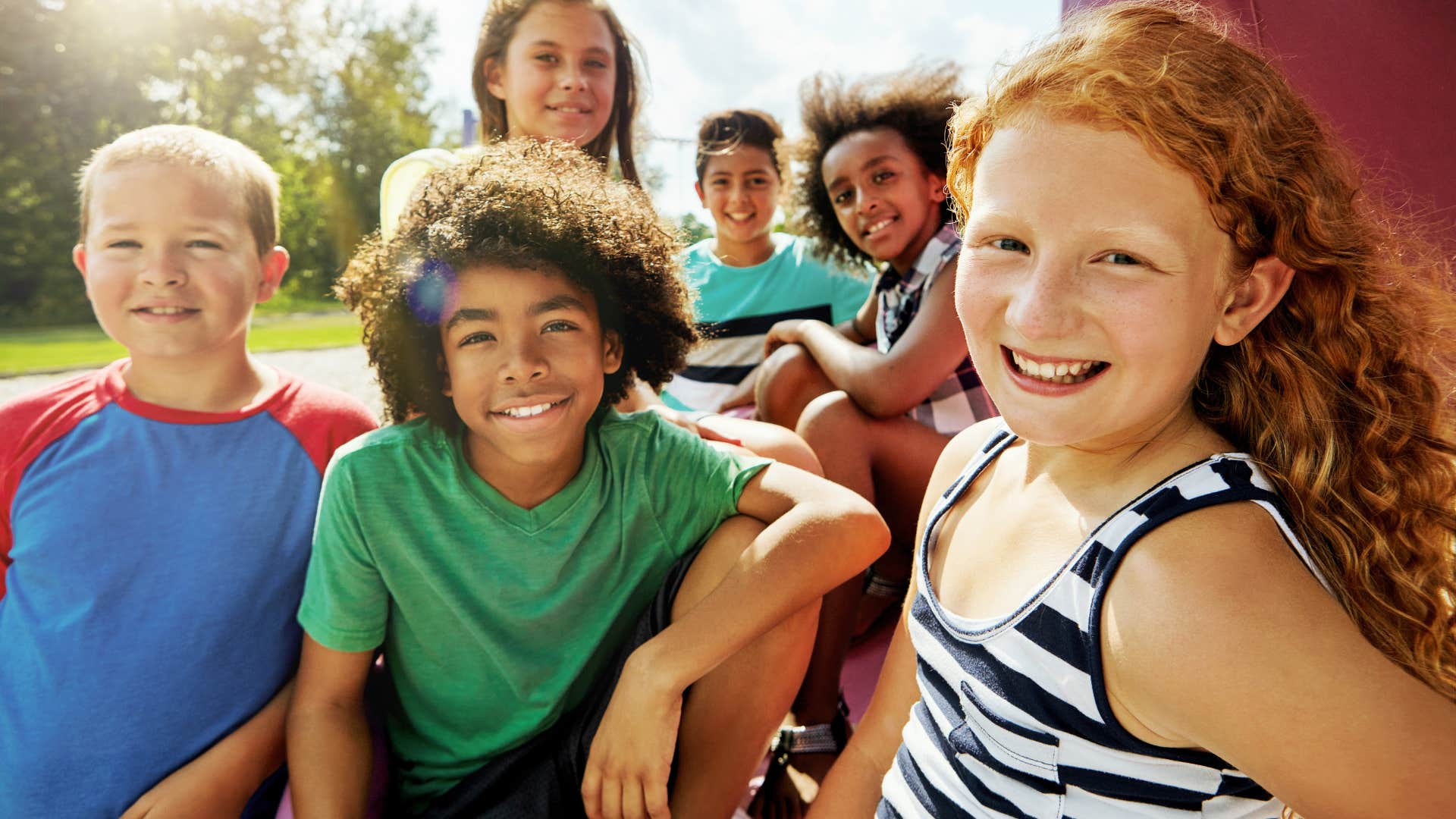 Kids with parents letting them play outside unsupervised.