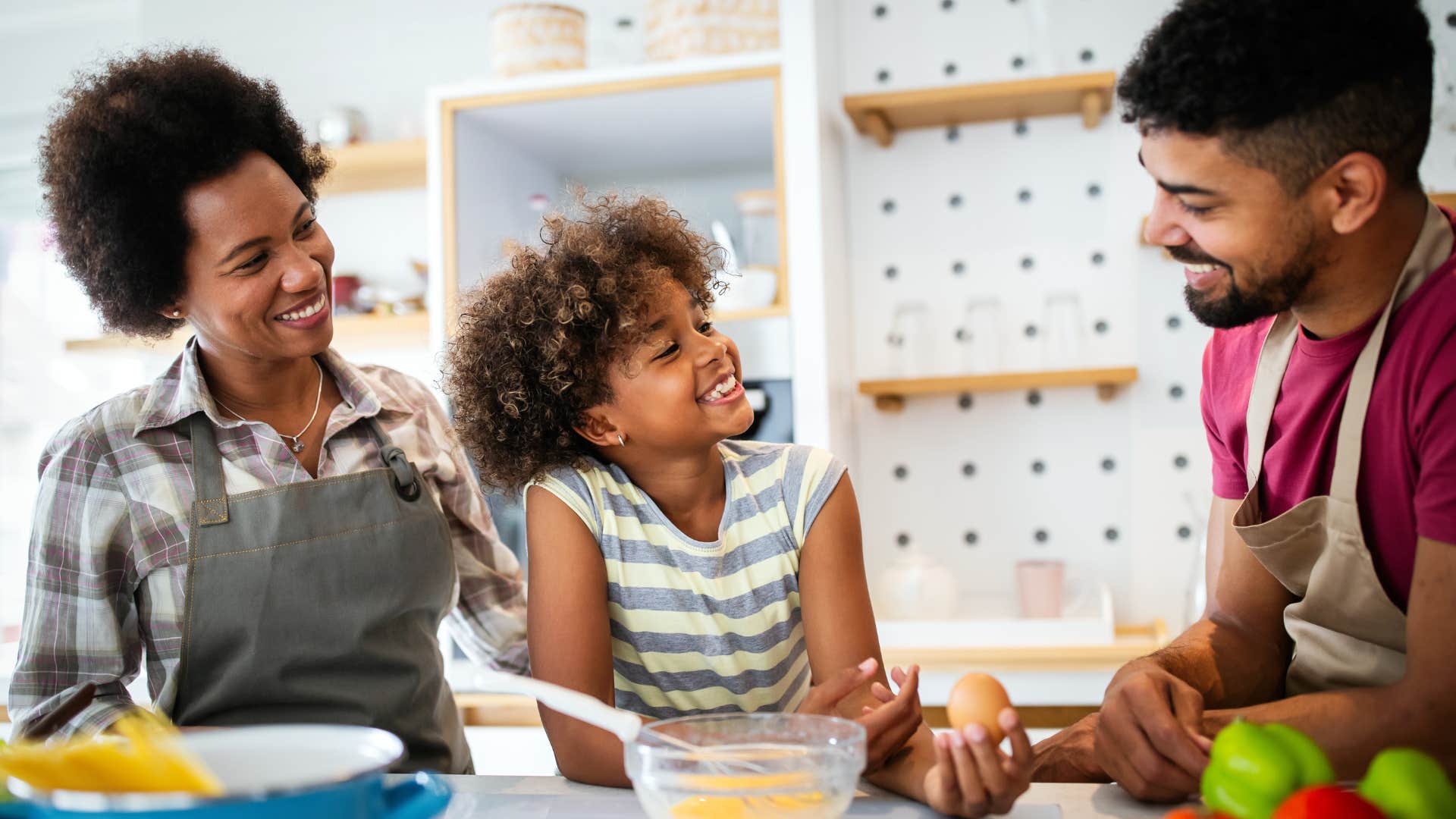 Woman prioritizing family dinners at home with her parents.