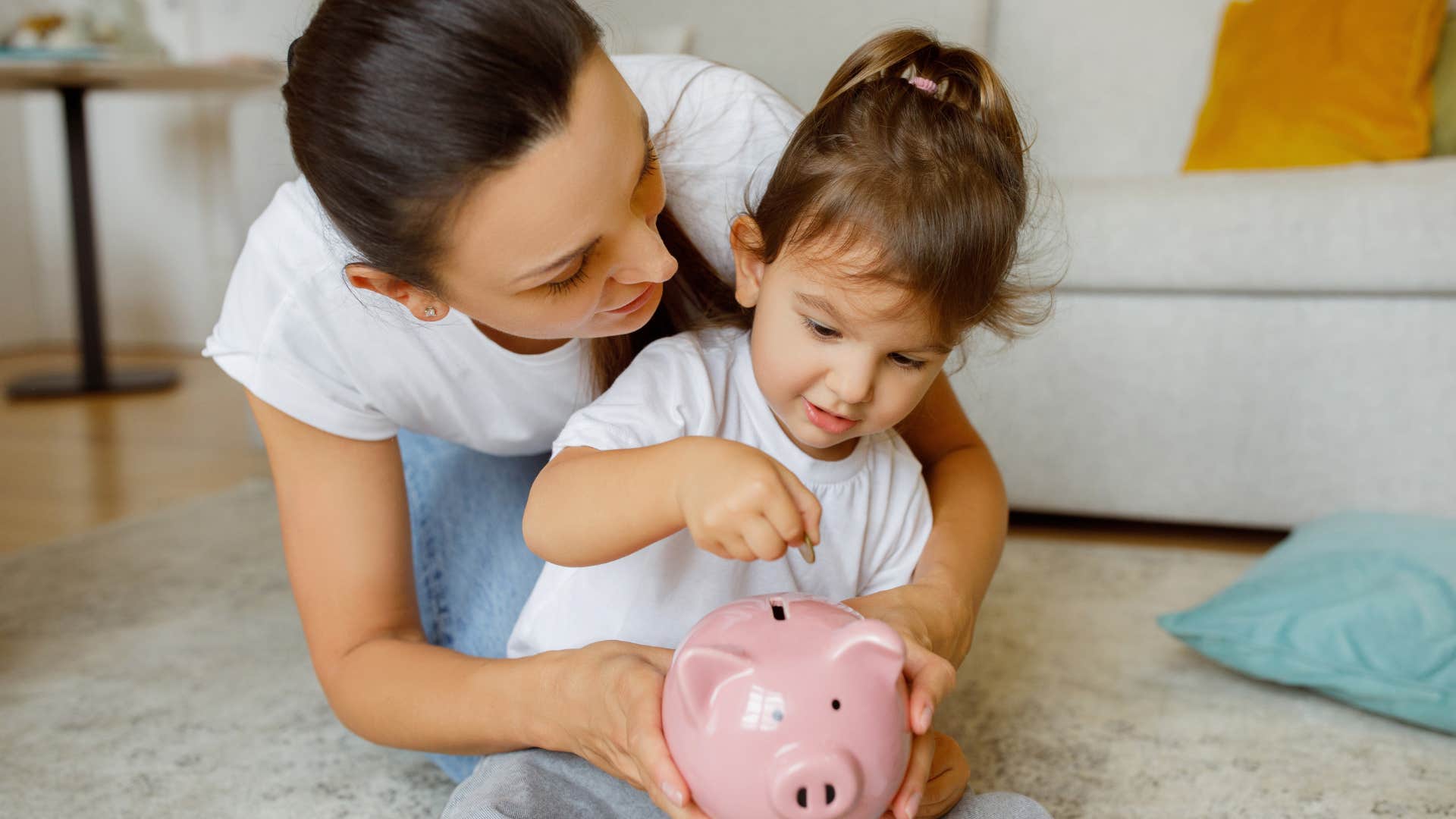 Woman teaching her daughter to save money instead of buying everything.