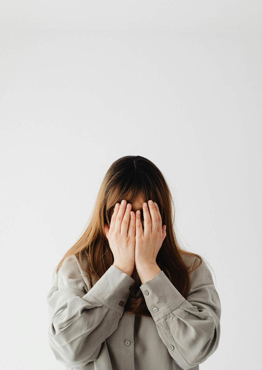 self-conscious woman