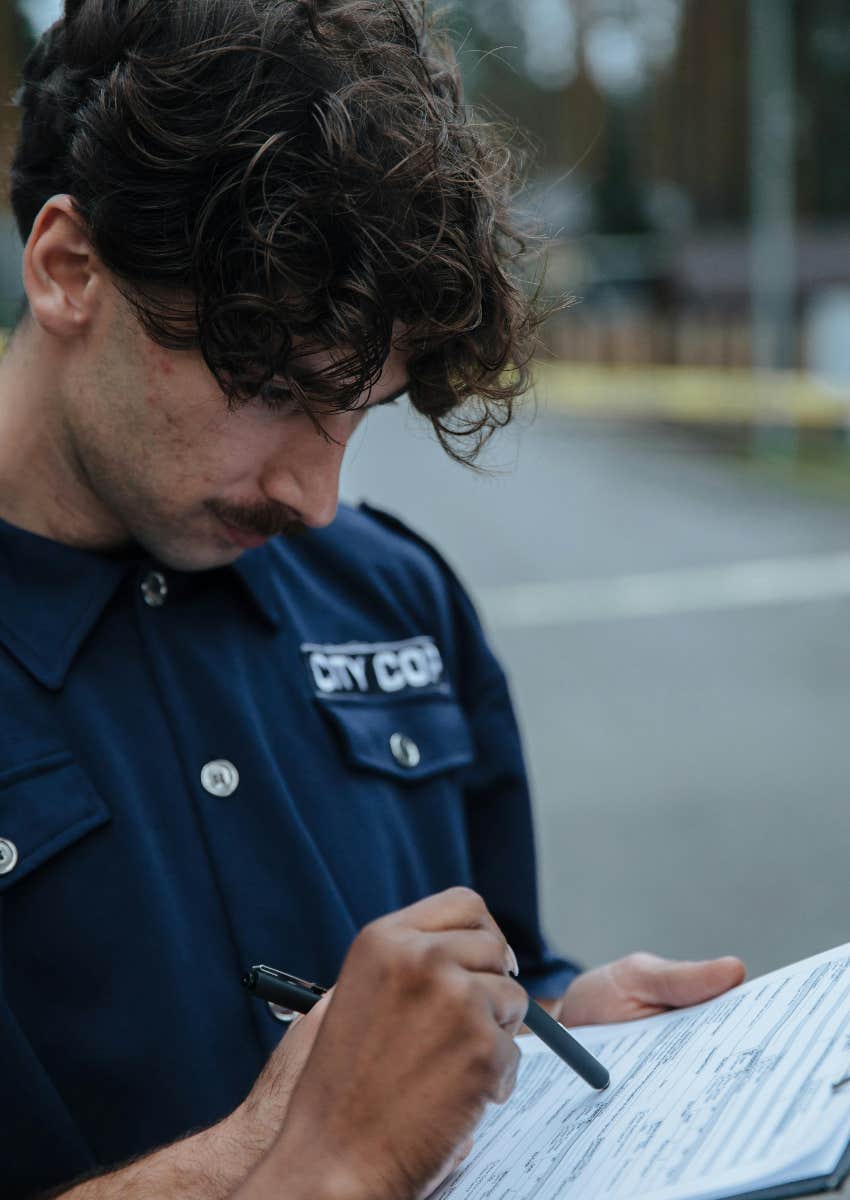 police officer making a report