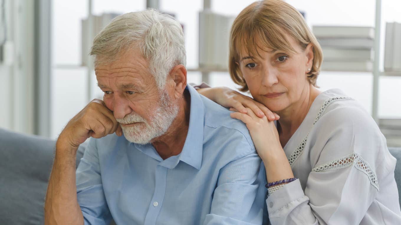 sad senior couple not doing great at home