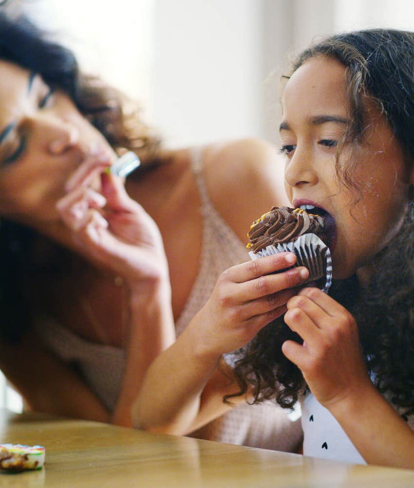 Happy child eats cupcake showing gift experience matters more