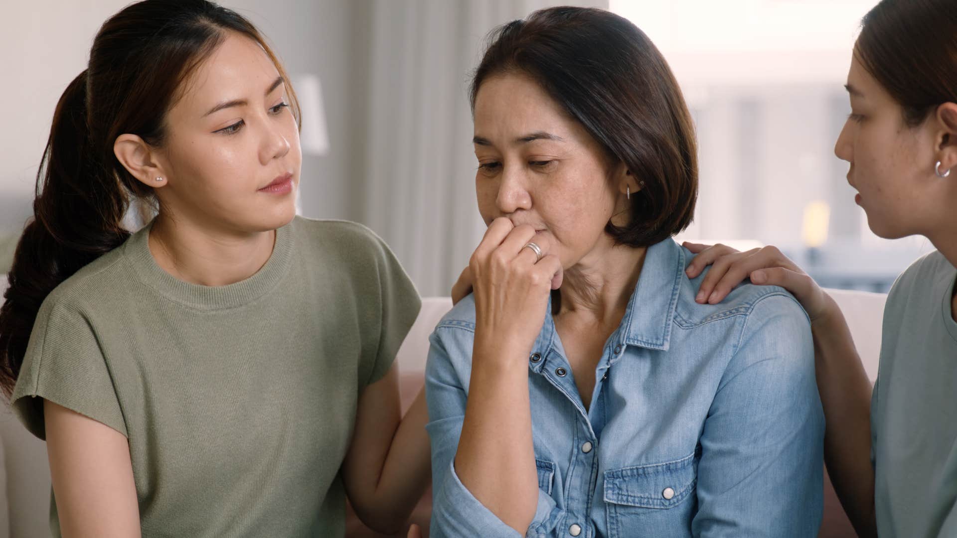 daughters comforting mother after she said they should be grateful