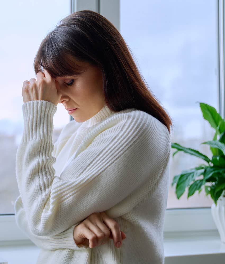 woman lonely because she can't find an ideal partner