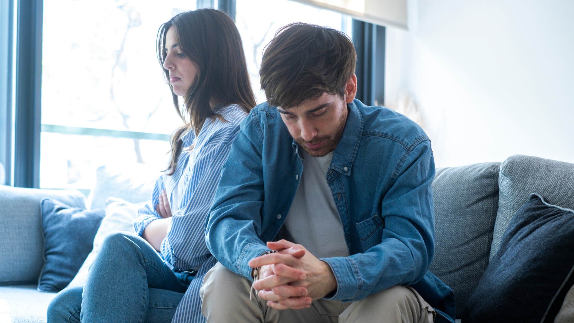 man not expressing his opinion as woman ignores him