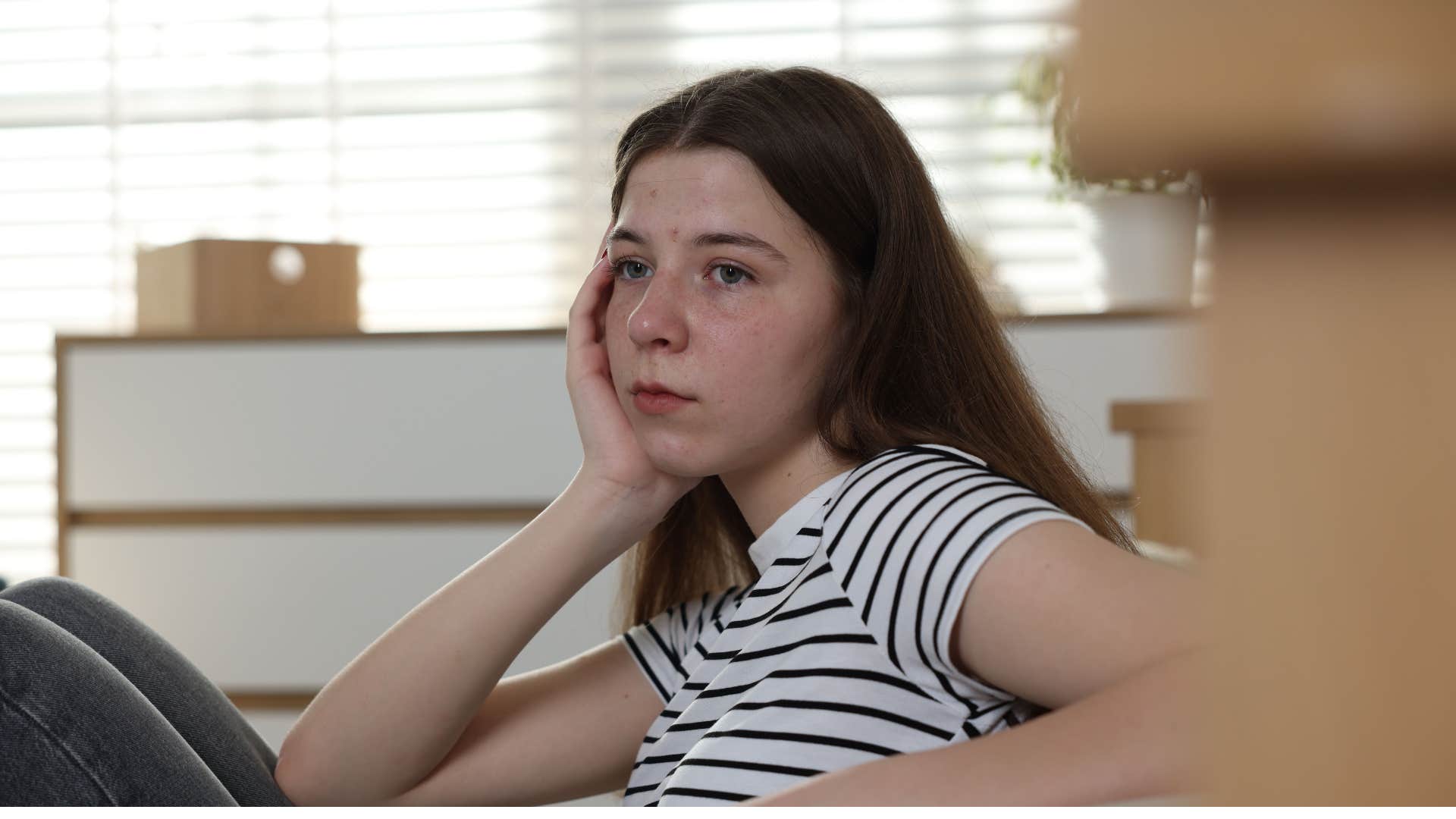 woman feeling sad that she never traveled