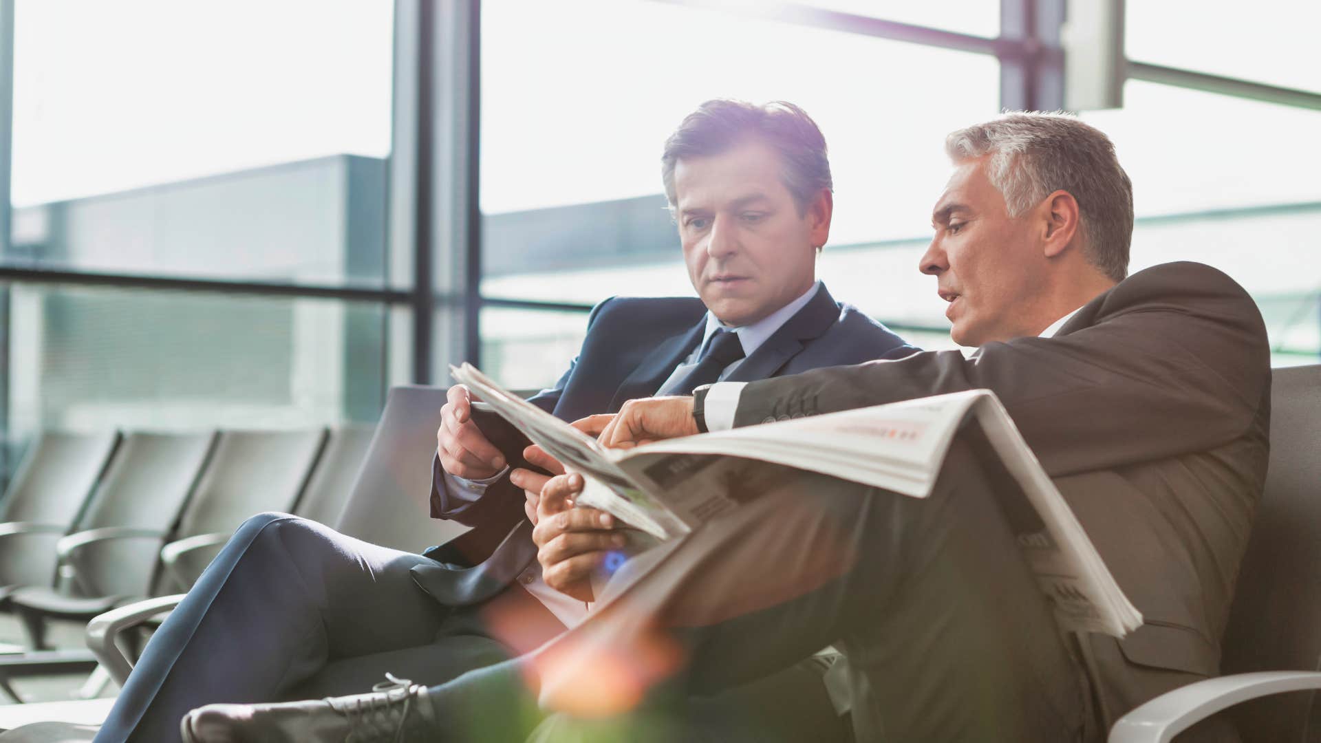 two men reading together as they believe that not everything should be disposable