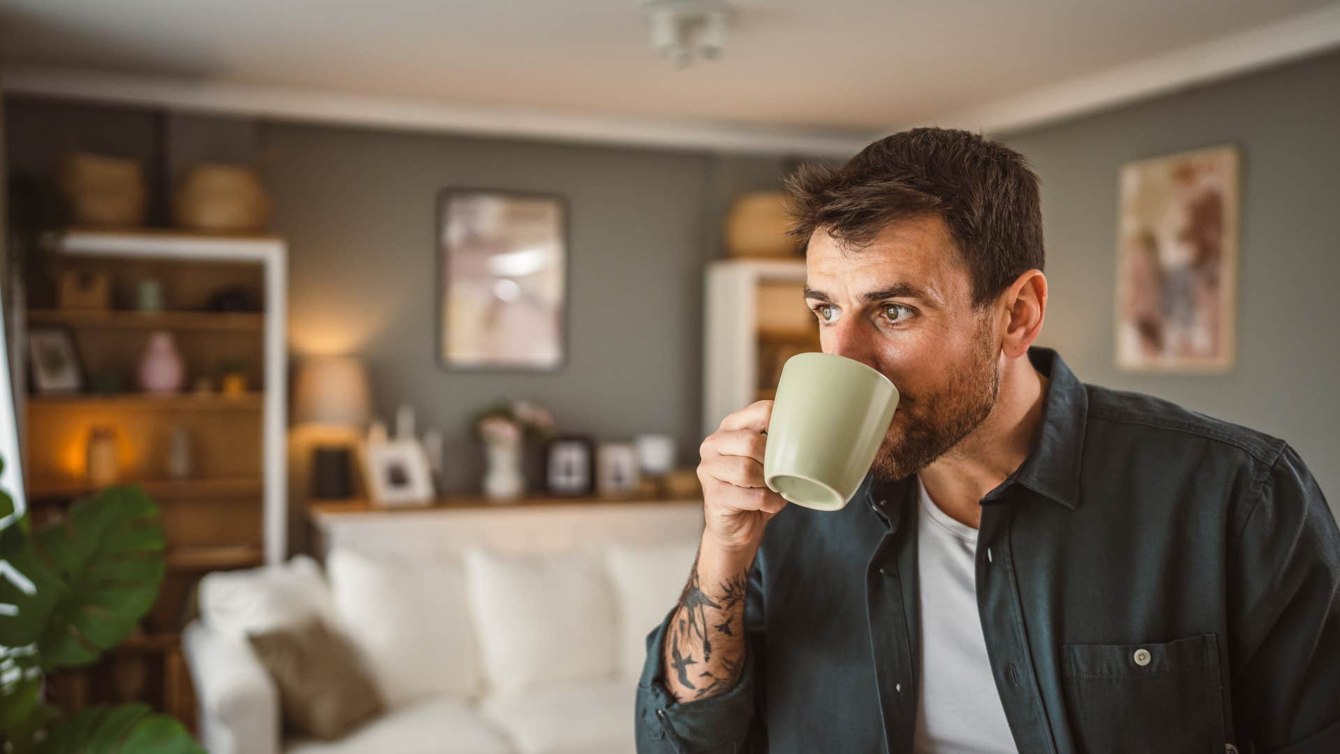 man sipping coffee as he believes that ritual has meaning