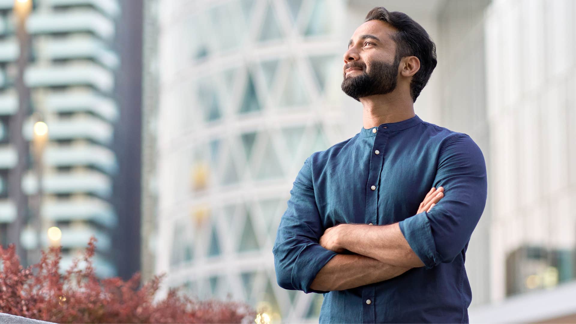 man smiling looking at the sky