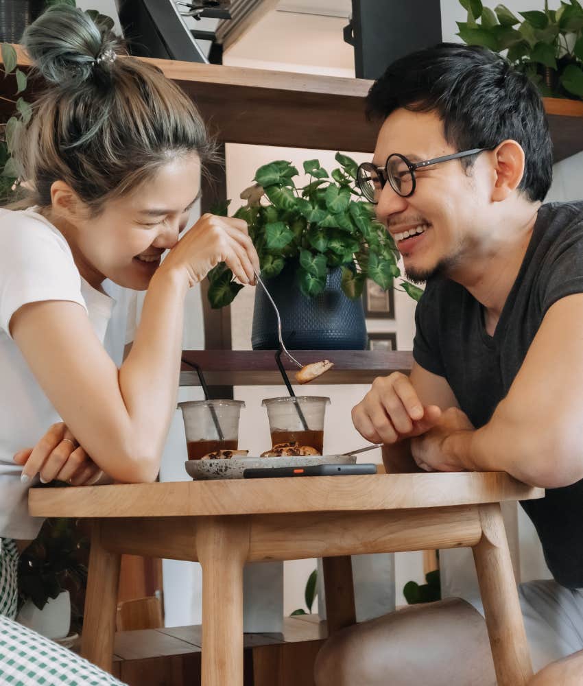 Laughing couple connect in conversation showing life-long love