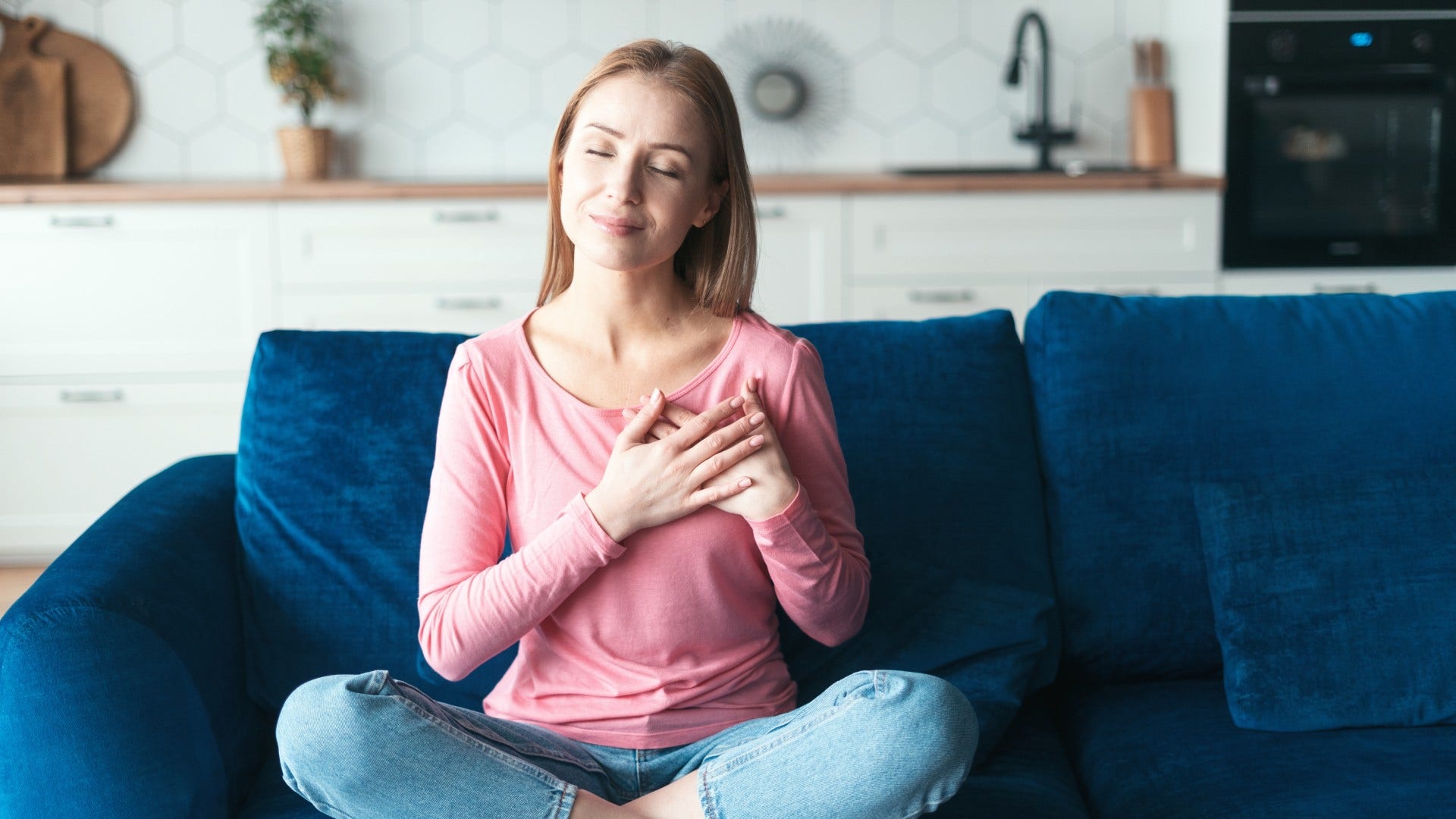 woman who doesn't let a breakup derail her by being kind to herself