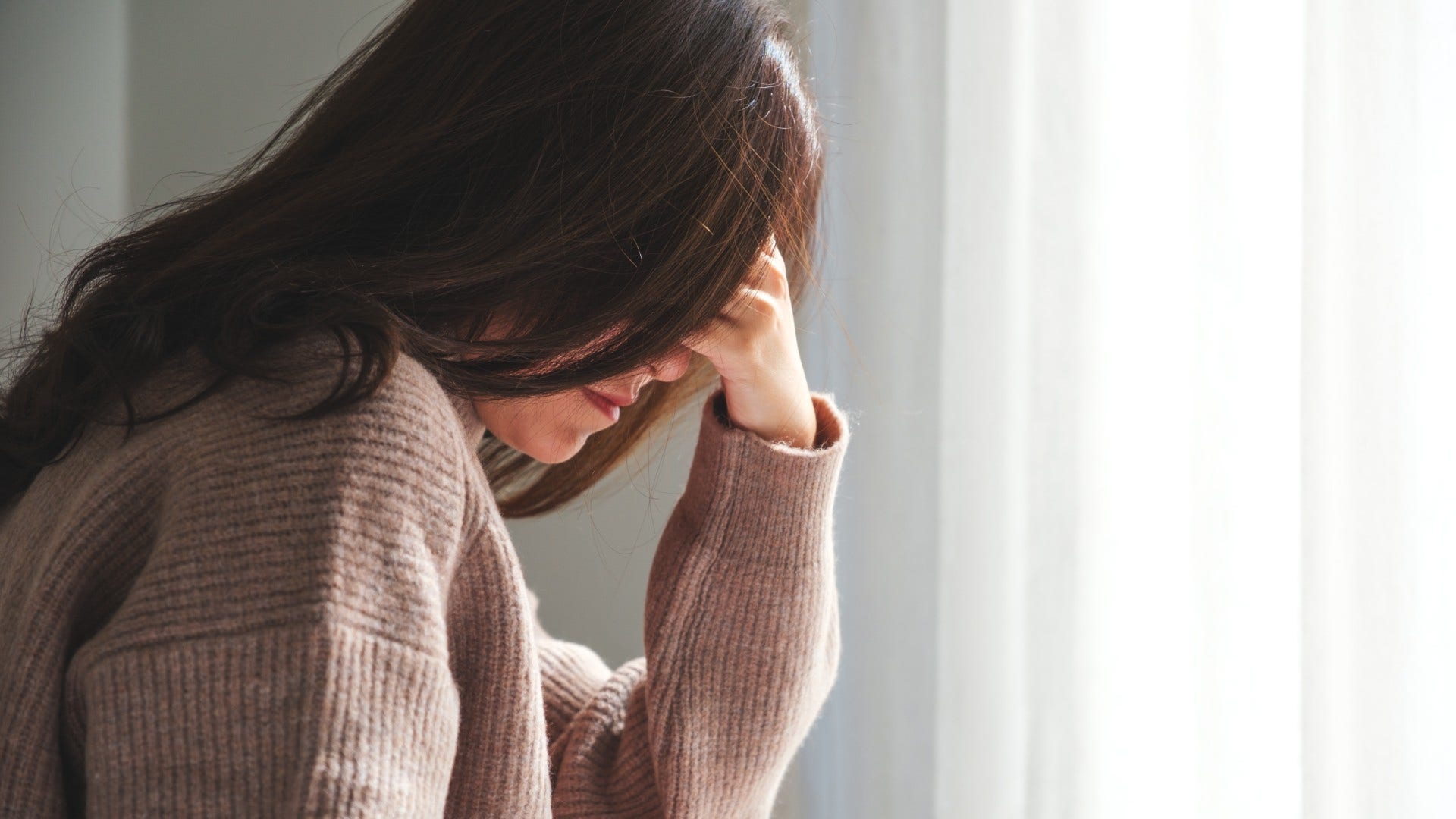 woman who doesn't let breakup derail her by letting it out