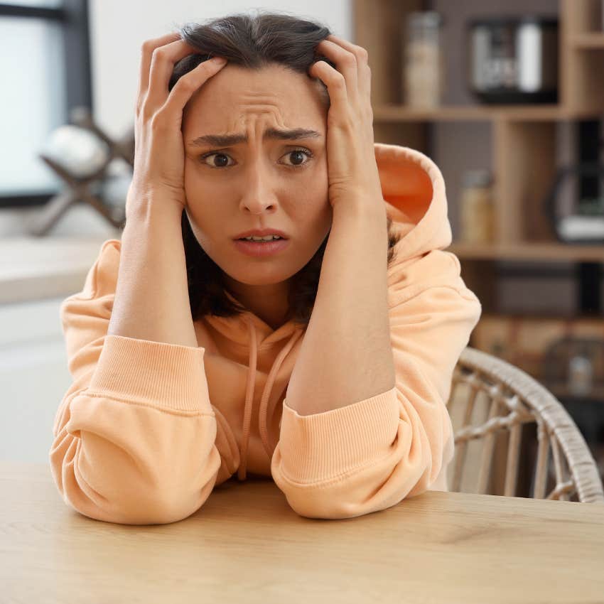 woman who freezes at making big decisions because she has a fear of failure