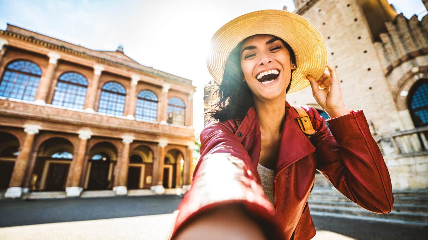 woman taking selfie on vacation