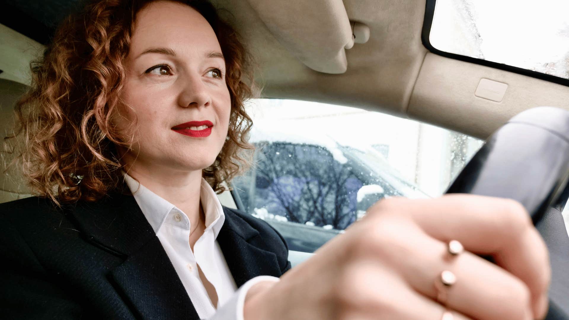 woman concentrating while driving a car