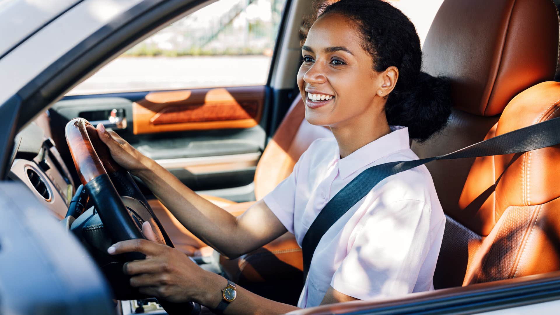 calm woman thinking deeply while driving